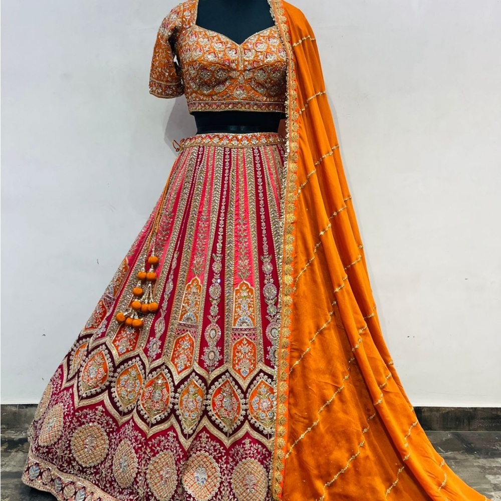 Vibrant Orange and Red Banarasi silk bridal lehenga Choli